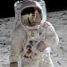 A astronaut walking on the moon Description automatically generated