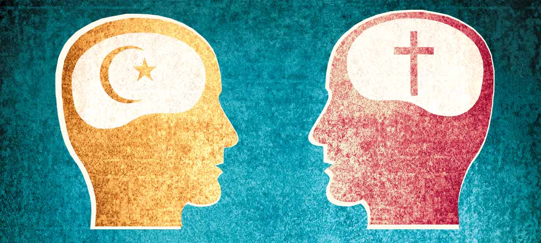 Two heads facing each other

Description automatically generated