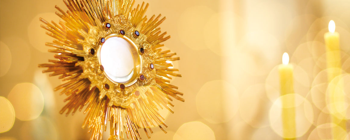 A picture containing gold, candle, amber, ornament

Description automatically generated